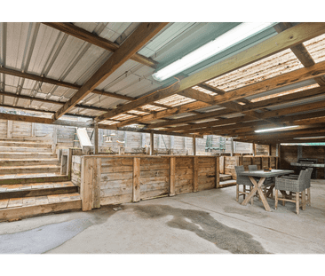 Spacious Three-Bedroom Home with Multiple Living Areas - Photo 6