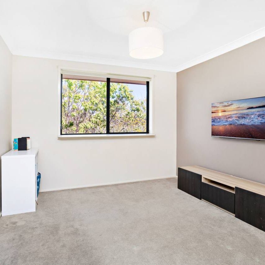 Low maintenance family living - Photo 1