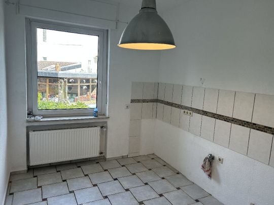 Charmante Altbauwohnung mit Wintergarten, Terrasse und Gartenfläche in Leverkusen-Manfort! - Photo 1