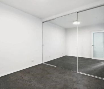 Bright two bedroom with storage cage. - Photo 2