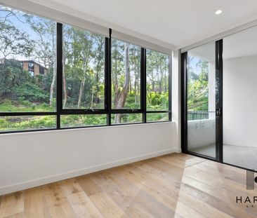 Light-Filled Apartment in One Avon's Prestigious Parkland Setting - Photo 1