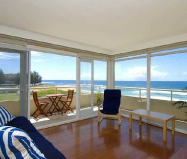 Top Floor Coastal Apartment with Panoramic Ocean Views - Photo 1