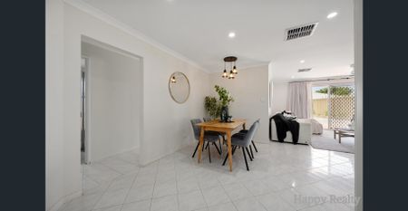 Stylish 4-Bedroom Family Home with Low-Maintenance Living - Photo 3