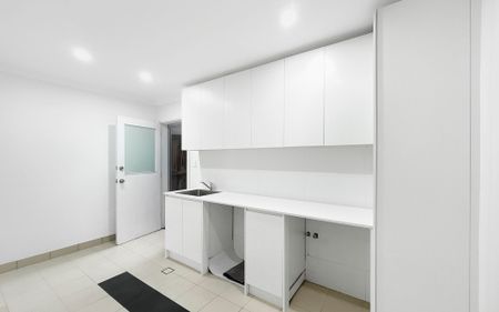 Modern Family Home with Basement Parking - Photo 3