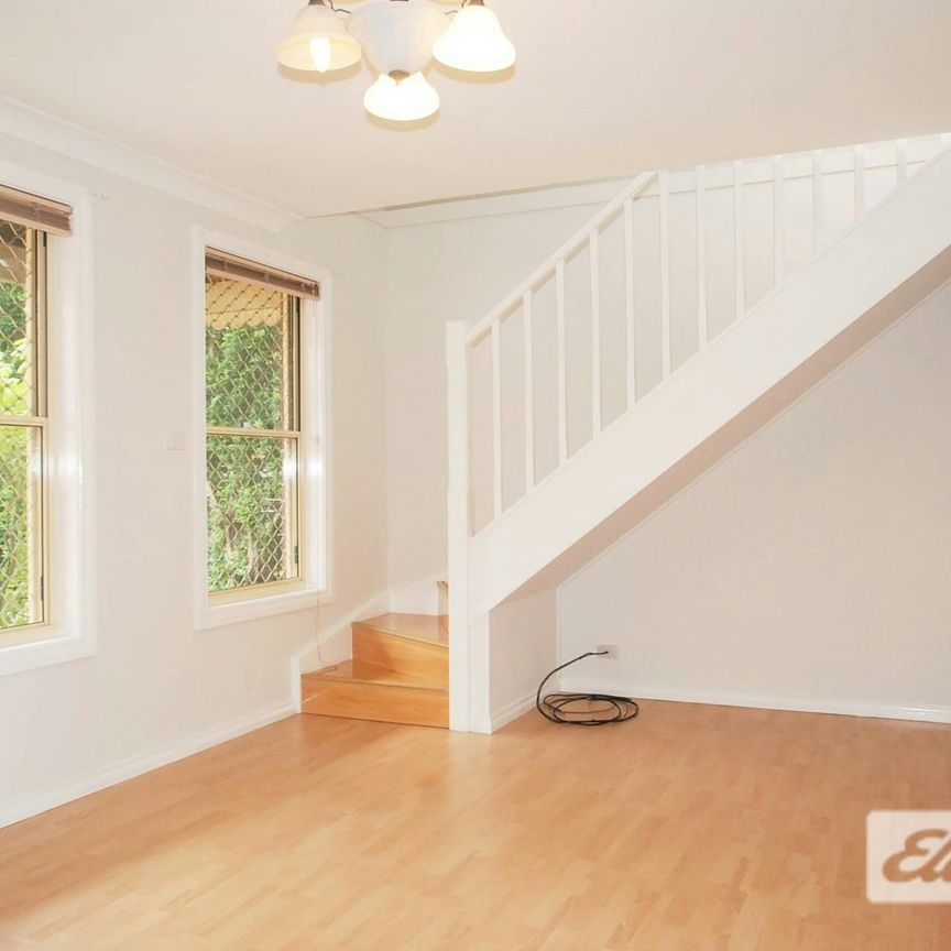 Spacious Two-Bedroom Townhouse Plus Study with Private Courtyard - Photo 1