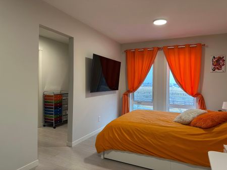 Private Rooftop Patio & Bonus Room | 2 Bed Townhouse In Vibrant Seton - Photo 4