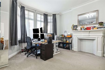 This beautifully designed, spacious two-bedroom period conversion offers over 1,000 sq. ft. of elegant living space on the ground floor of a charming property. - Photo 3