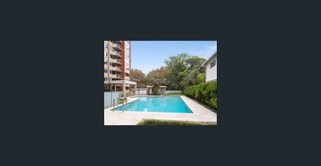 Light And Bright Two Bedroom Apartment with pool in Security Building - Photo 3