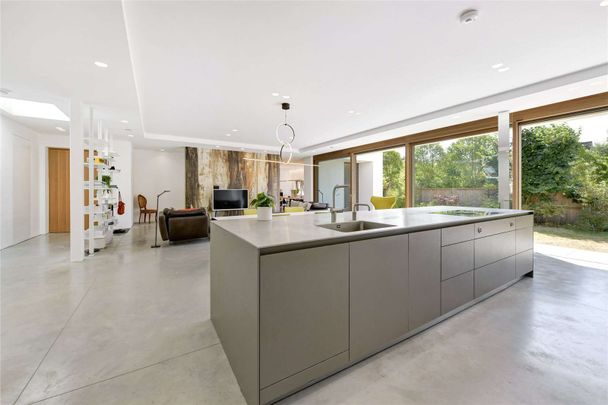 A fantastic, contemporary four bedroom home located on the prestigious West Hill Road. - Photo 1