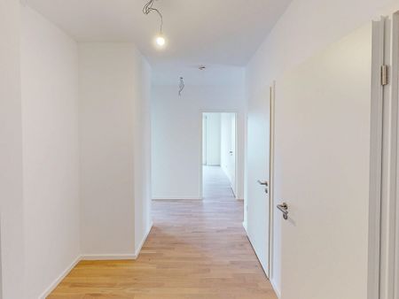 Neubau! 4-Zimmer-Wohnung mit Balkon und zwei Bädern (mietpreisgedämpft) - Photo 4