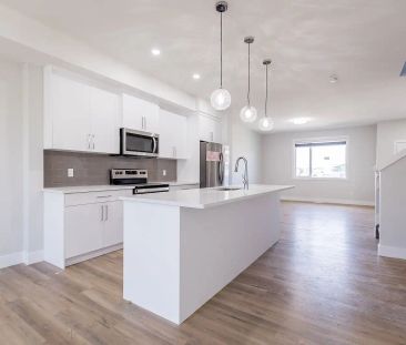 END UNIT - 3 Bed Mainfloor Townhouse in CHAPPELLE — 3 Bedrooms Main Floor - Photo 1