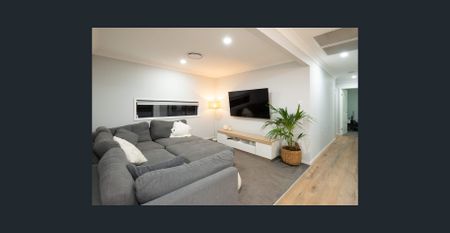 A Warm and Welcoming Family Retreat in the Camelot Estate - Photo 3