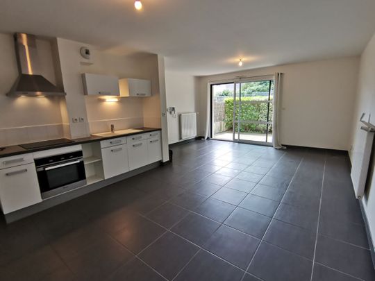 APPARTEMENT AVEC JARDIN+PARKING - Photo 1