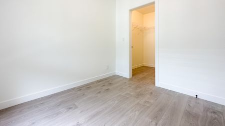 2 Bed Condo | Latimer Village Langley | Storage • Parking - Photo 3