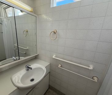 Tucked away in a sought-after beachside locale, this apartment is a... - Photo 3