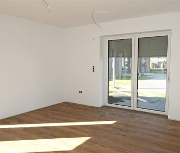 Ansprechende Neubauwohnung mit Terrasse in schöner Lage von Schortens! - Foto 1