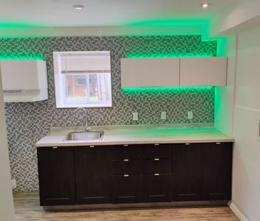 3 1/2 24E Ave, Grand Demi Sous-Sol - Photo 1