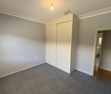 TIDY THREE BEDROOM HOME - Photo 1