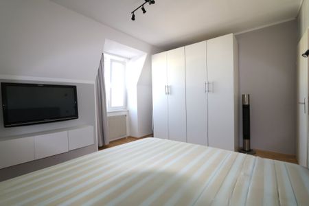 Moderne 3-Zimmer-Wohnung im Dachgeschoss mit Tiefgaragenplatz - Photo 5