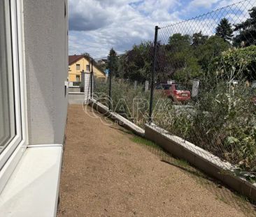 Pronájem moderního bytu 1+kk s předzahrádkou a parkovacím místem v ... - Photo 2