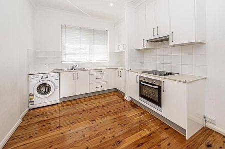 Beautifully Updated 3-Bedroom Semi with Secure Garage & Ample Storage - Photo 2