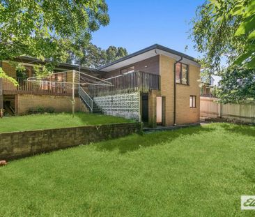Spacious 4-Bedroom Home in Prime West Wollongong Location - Photo 4