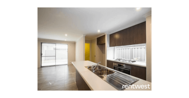 COMFORTABLE HOME WITH ENCLOSED YARD - Photo 1