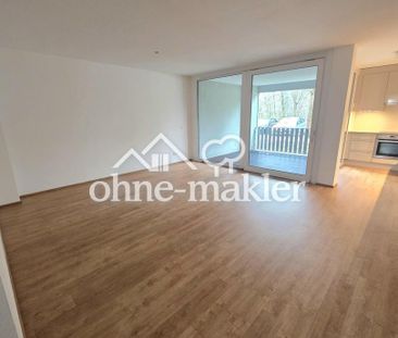 Exklusive 2,5-Zimmer Wohnung 70m² mit Loggia im EG & Blick ins Grüne - Photo 3