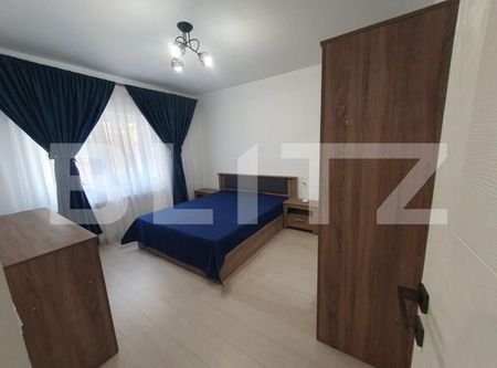 Apartament modern cu 2 camere, parcare privată, cartierul 1 Mai - Fotografie 2