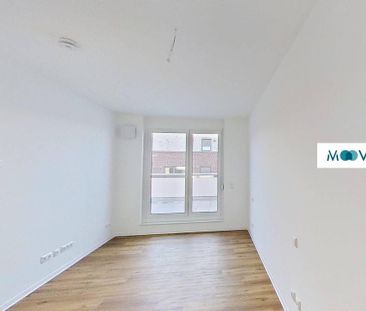 Besonders geschnittene 2-Zimmer-Wohnung mit Dachterrasse und EBK im... - Photo 4