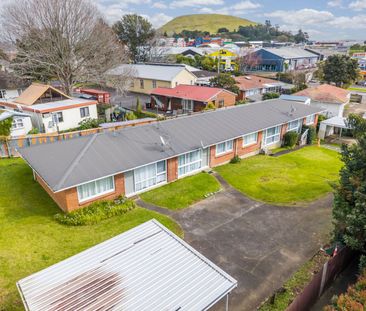 Freshly Renovated brick and tile! - Photo 6