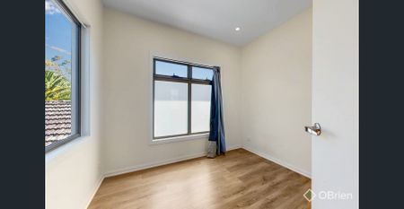 Contemporary Comfort Meets Low-Maintenance Living - Photo 2