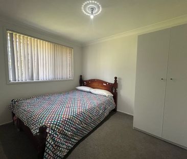 Cozy Family Home in a Hassle Free Location! - Photo 1