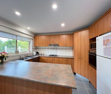 Immaculate Three-Bedroom in Prime Location - Photo 6