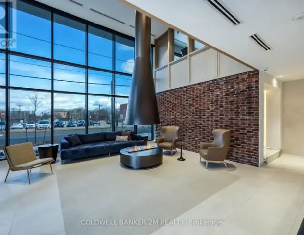311 - 201 BROCK STREET | 311 - 201 BROCK STREET, Whitby - Photo 1