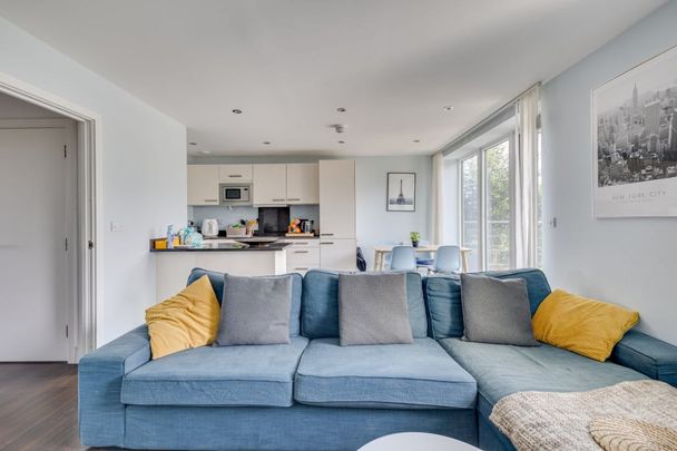 A modern two double bedroom flat on the second floor of this private development in Roehampton. Offered on a furnished/unfurnished basis and benefiting from underground parking. Available now. - Photo 1