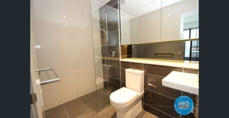 Stylish 2-Bedroom Apartment in the heart of Wentworth Point - Photo 2