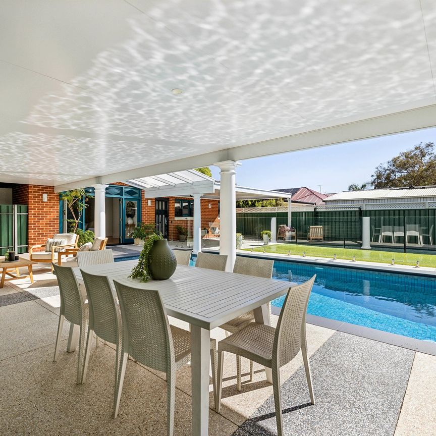 Open the door to resort-style living, close to everything that matters - Photo 1