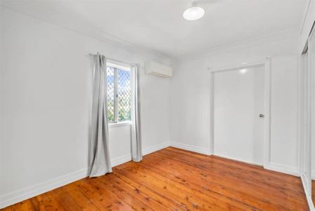 “Freshly Painted Post-War Home Moments from Markets” - Photo 3