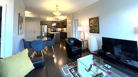 Modern 2 Bedroom Condo With Rooftop Patio In Prime Location - Photo 3