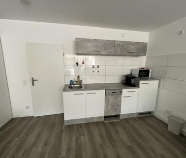 Apartment mit Einbauküche im- Erdgeschoss + Balkon - Foto 1