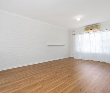 Refurbished unit in peaceful, well-connected suburb - Photo 4