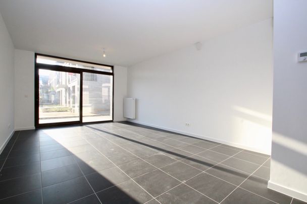 Gelijkvloers nieuwbouwappartement met zonnig terras! - Foto 1