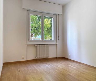Appartement de 4,5 pièces au rez-de-chaussée - Photo 3