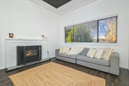 NEAT AND TIDY 3 BEDROOM HOME WITH HOME OFFICE - Photo 2