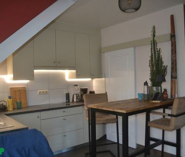 Centraal gelegen gezellig dakappartement met ruim terras - Photo 4