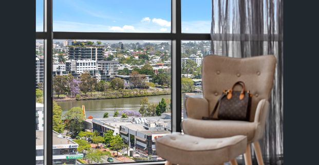 Experience luxury River living in the High lvl - Photo 1