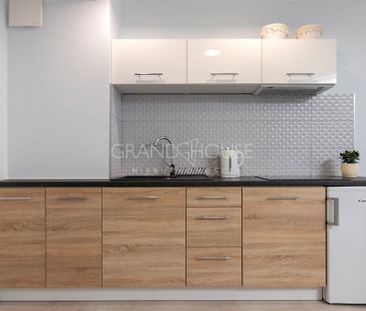 Atrakcyjna kawalerka w nowoczesnym budynku - Photo 6