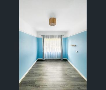 Comfortable Three-Bedroom Home in a Convenient Location - Photo 6