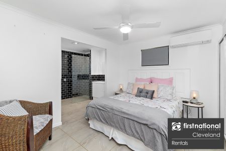 Modern Lowset Family Home with Side Access + Large Shed - Photo 5